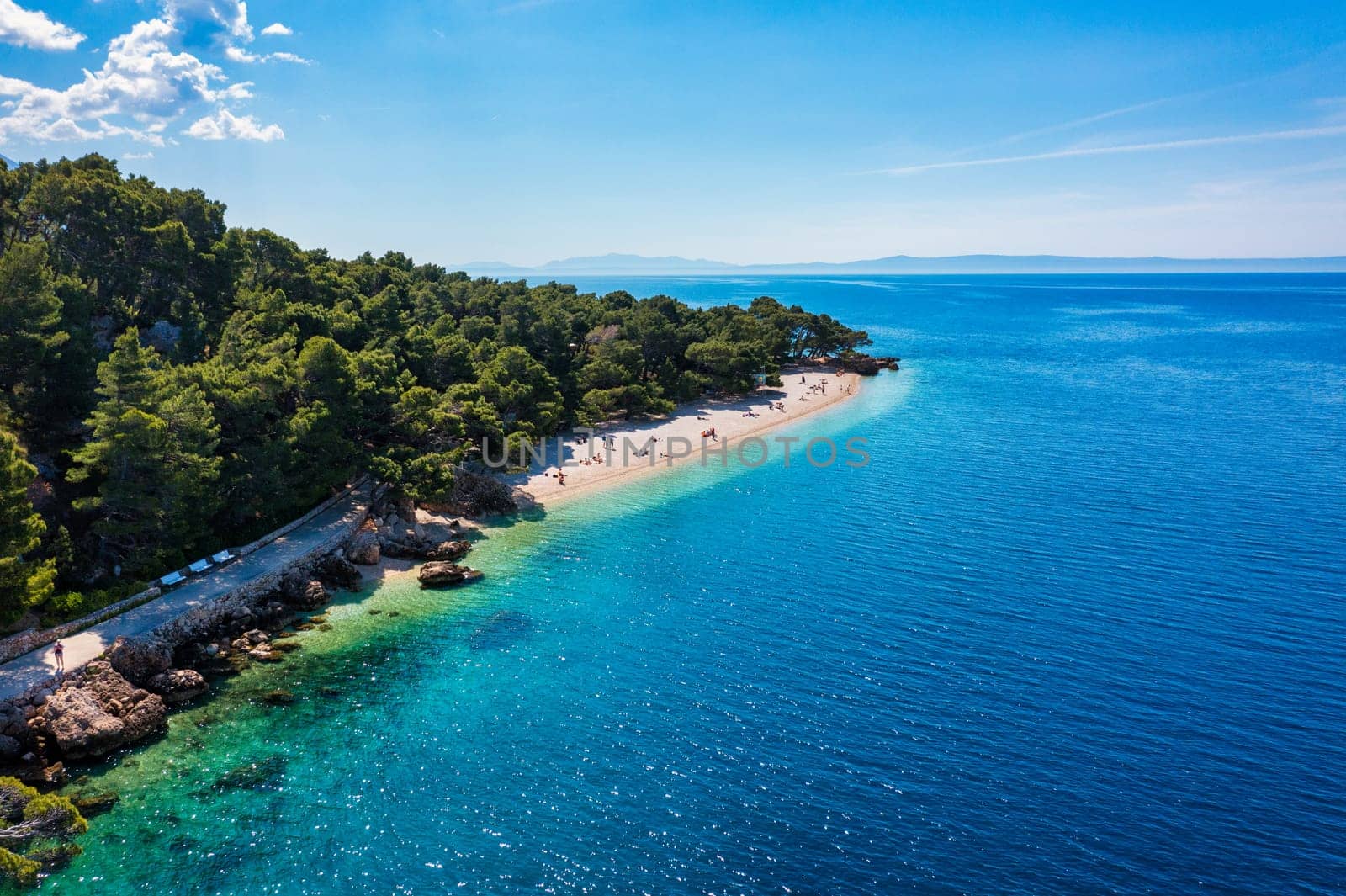 Beautiful aerial view of Punta Rata beach in Brela, Makarska Riviera, Croatia. Aerial view of Punta Rata beach and waterfront on Makarska riviera, Brela, Dalmatia region of Croatia.