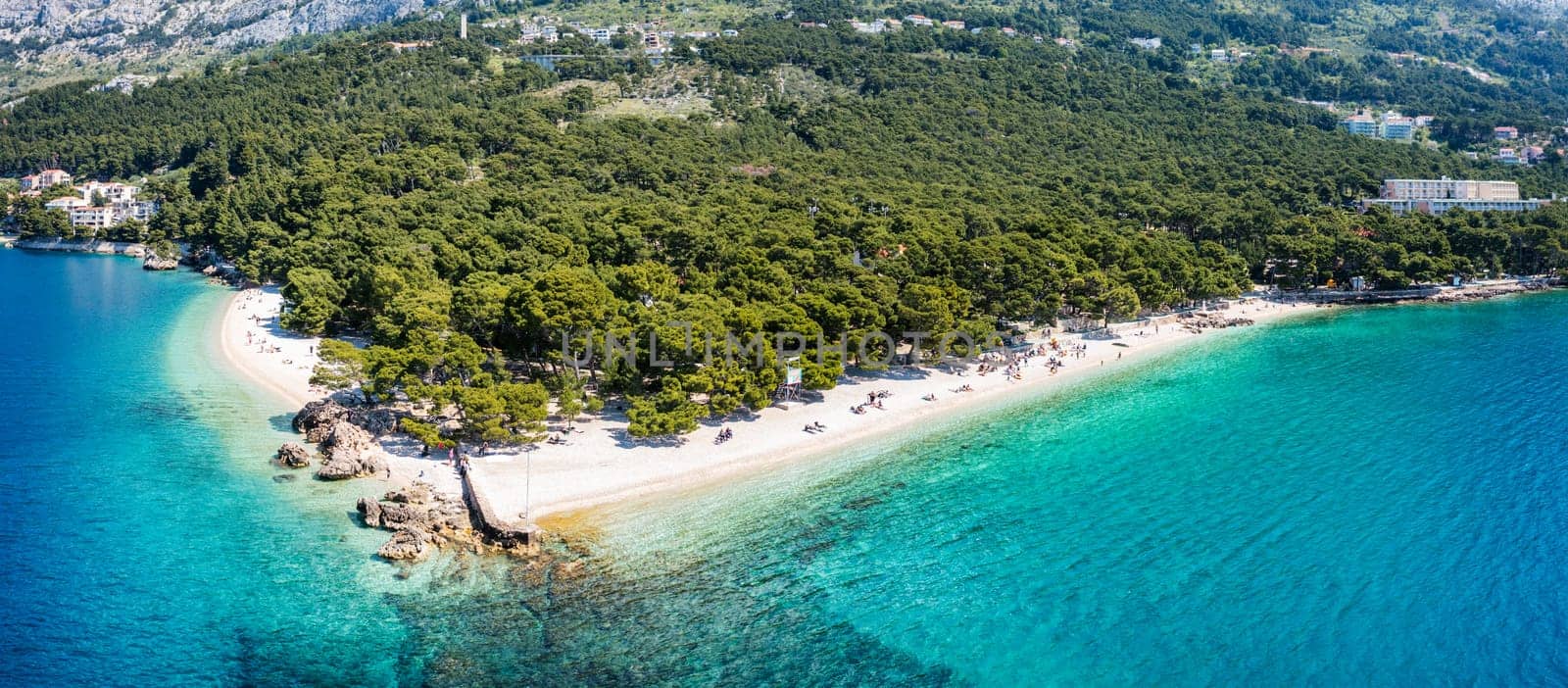 Beautiful aerial view of Punta Rata beach in Brela, Makarska Riviera, Croatia. Aerial view of Punta Rata beach and waterfront on Makarska riviera, Brela, Dalmatia region of Croatia.