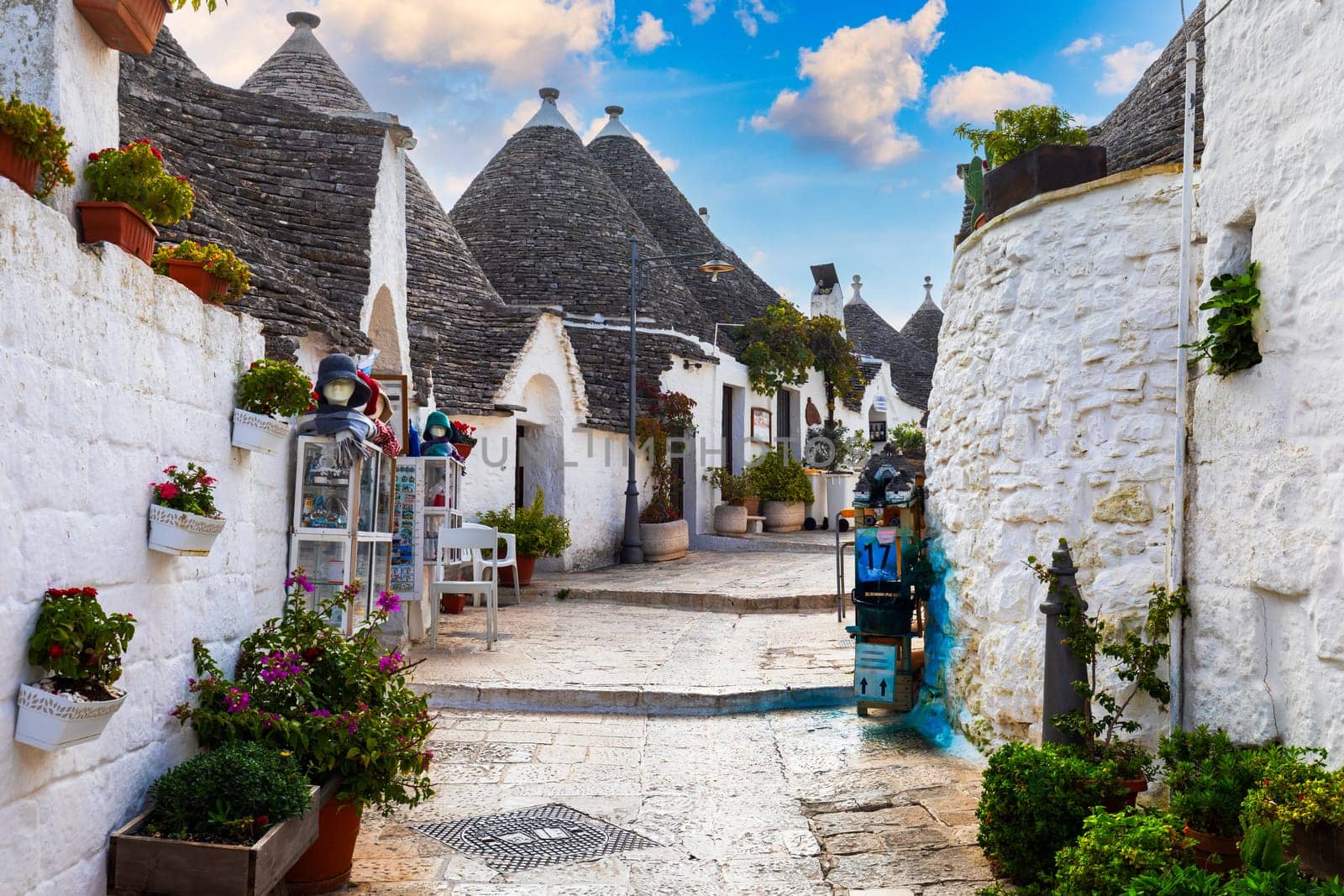 The traditional Trulli houses in Alberobello city, Apulia, Italy. Cityscape over the traditional roofs of the Trulli, original and old houses of this region, Apulia, Alberobello, Puglia, Italy. 