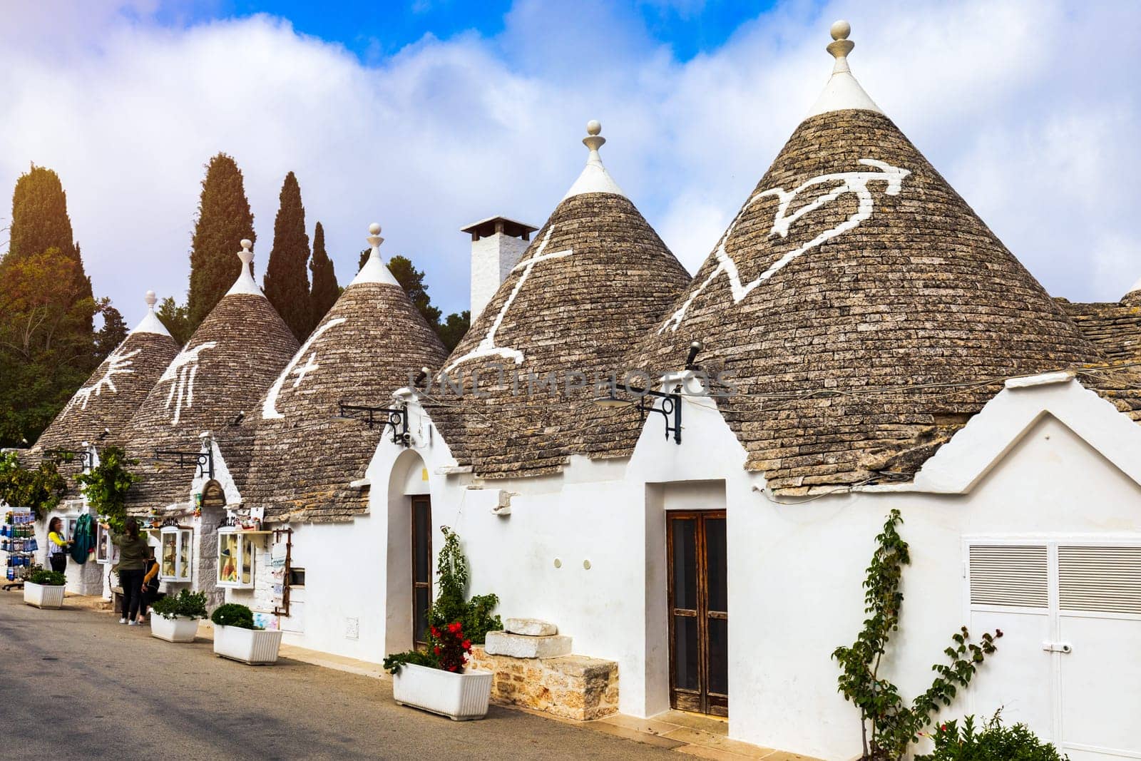 The traditional Trulli houses in Alberobello city, Apulia, Italy. Cityscape over the traditional roofs of the Trulli, original and old houses of this region, Apulia, Alberobello, Puglia, Italy. 