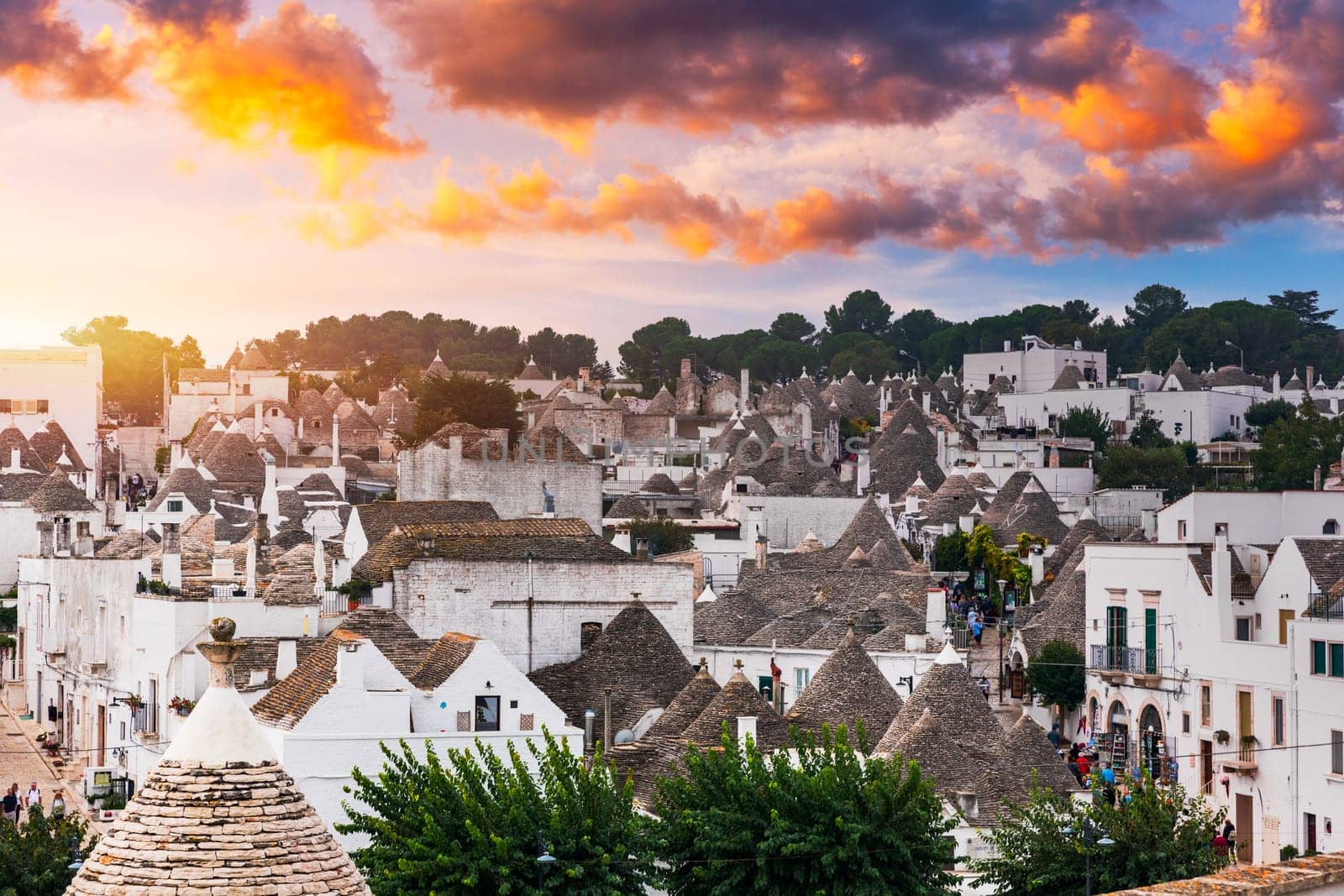 The traditional Trulli houses in Alberobello city, Apulia, Italy. Cityscape over the traditional roofs of the Trulli, original and old houses of this region, Apulia, Alberobello, Puglia, Italy. 