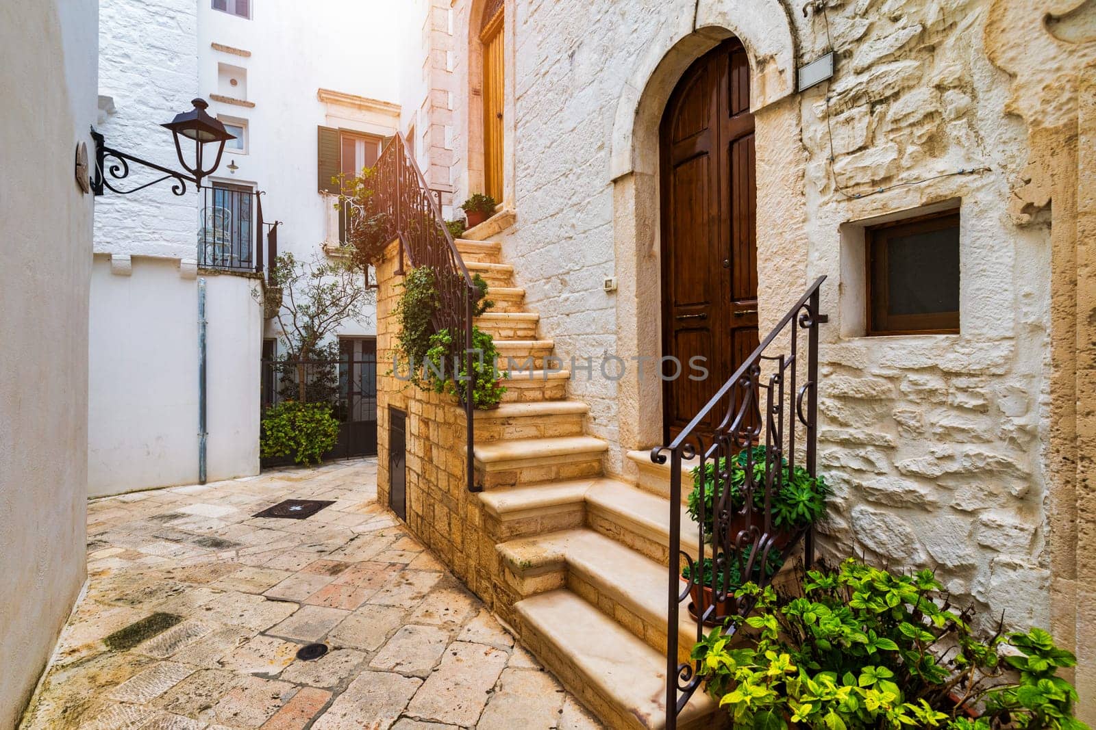 Scenic sight in Locorotondo, Bari Province, Apulia (Puglia), Italy. Characteristic streets in the Locorotondo in Puglia, Italy. Locorotondo is a town of the Metropolitan City of Bari, Apulia, Italy.