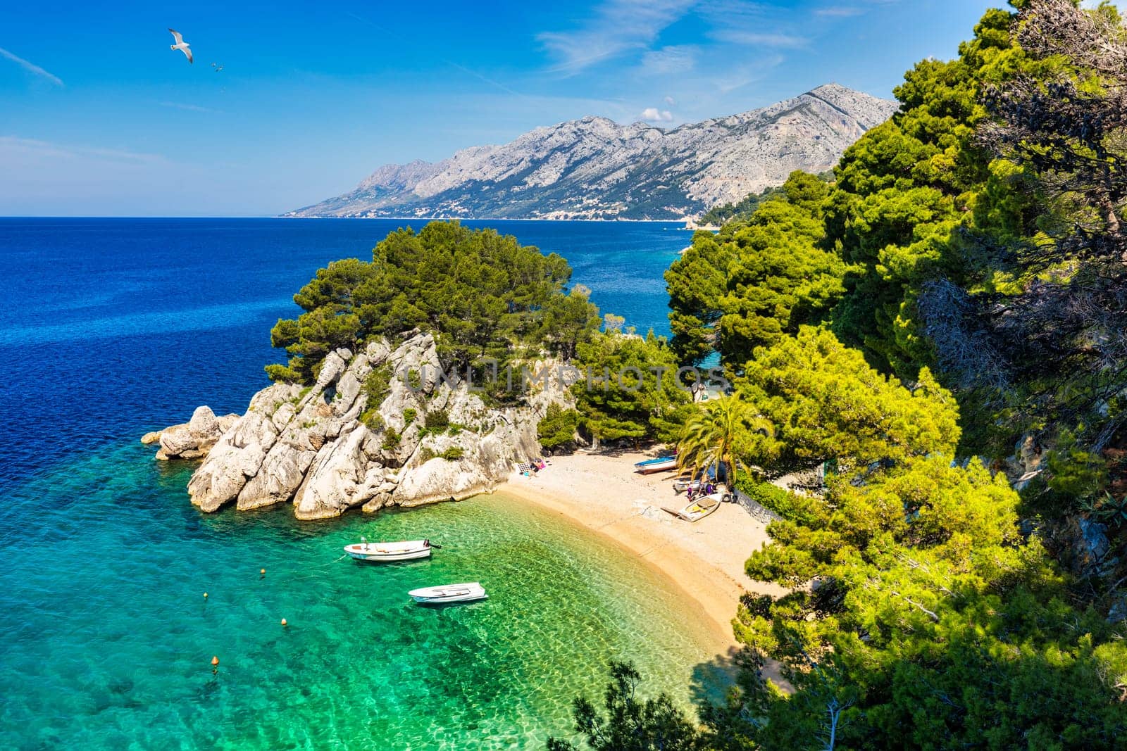 Amazing aerial view of the beautiful Podrace beach in Brela, Makarska Riviera, Croatia. Aerial view of Podrace beach and waterfront on Makarska riviera, Brela, Dalmatia region of Croatia.