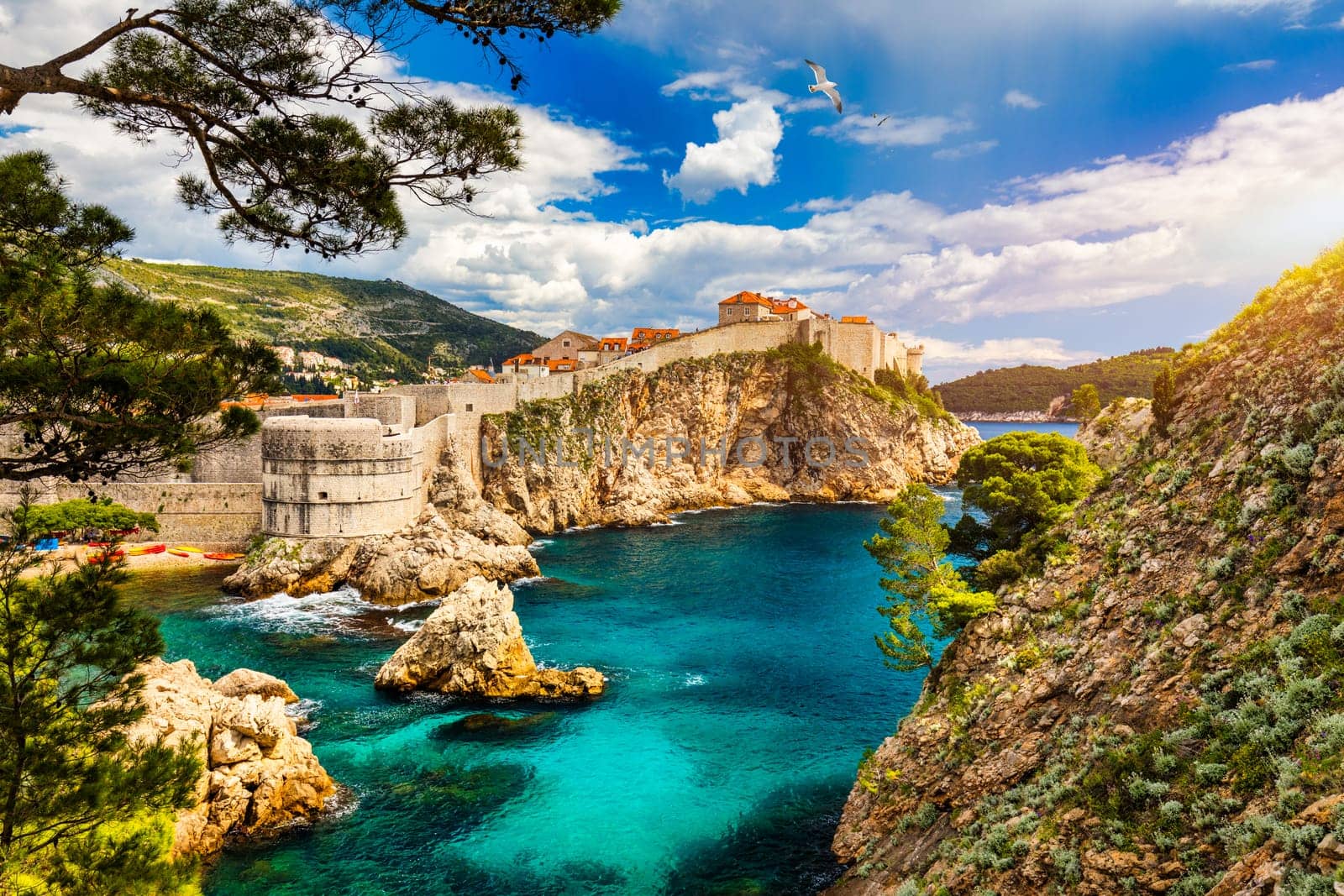 Dubrovnik a city in southern Croatia fronting the Adriatic Sea, Europe. Old city center of famous town Dubrovnik, Croatia. Picturesque view on Dubrovnik old town (medieval Ragusa) and Dalmatian Coast.