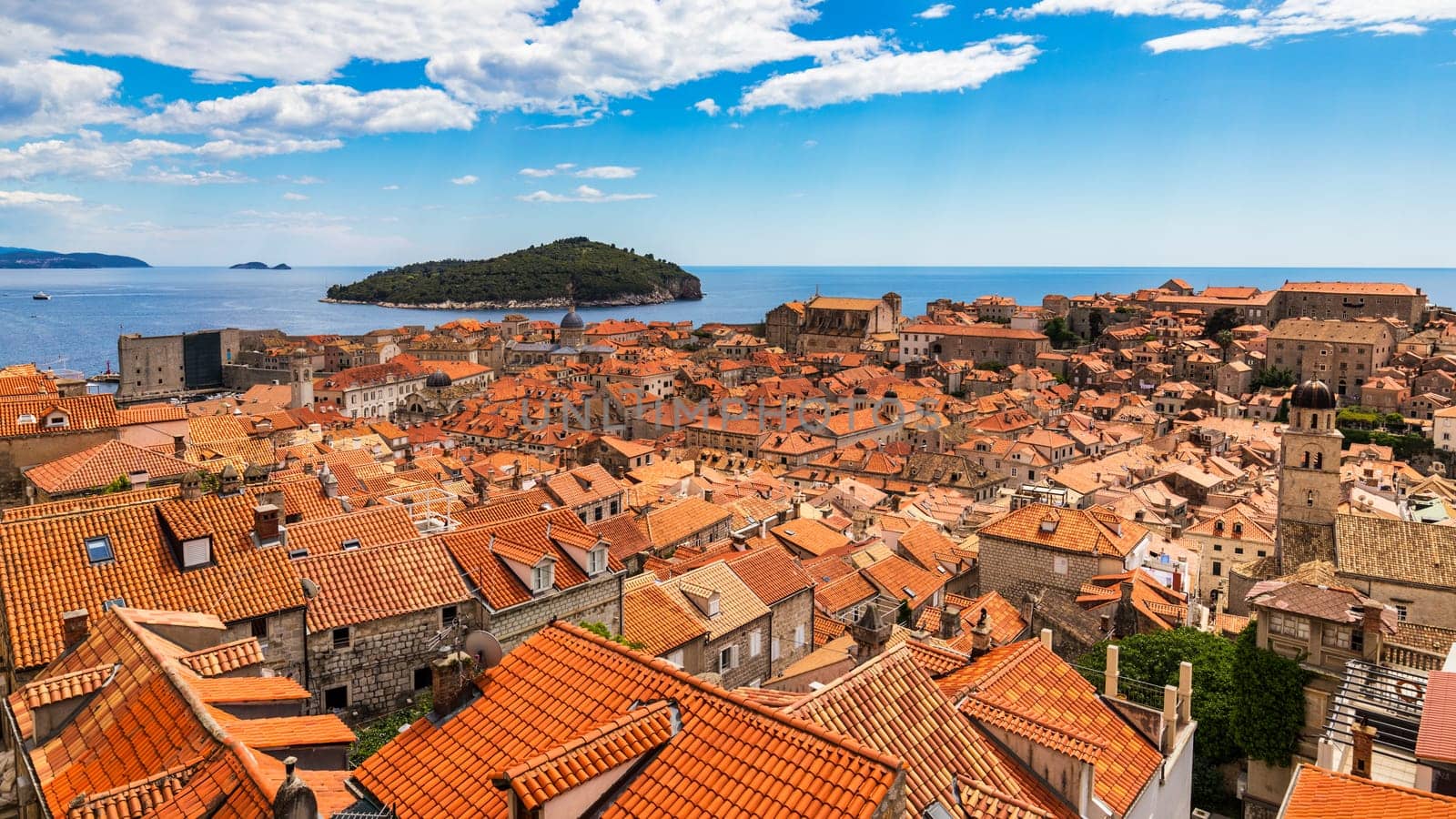 Dubrovnik a city in southern Croatia fronting the Adriatic Sea, Europe. Old city center of famous town Dubrovnik, Croatia. Picturesque view on Dubrovnik old town (medieval Ragusa) and Dalmatian Coast. by DaLiu