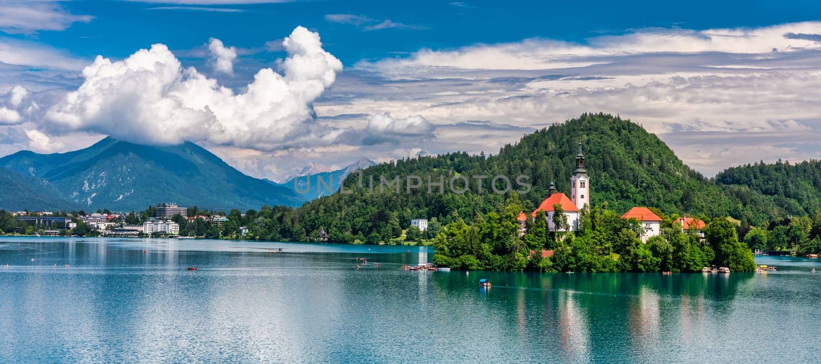 Lake Bled in Slovenia. Beautiful mountains and Bled lake with small Pilgrimage Church. Bled lake and island with Pilgrimage Church of the Assumption of Maria. Bled, Slovenia, Europe.