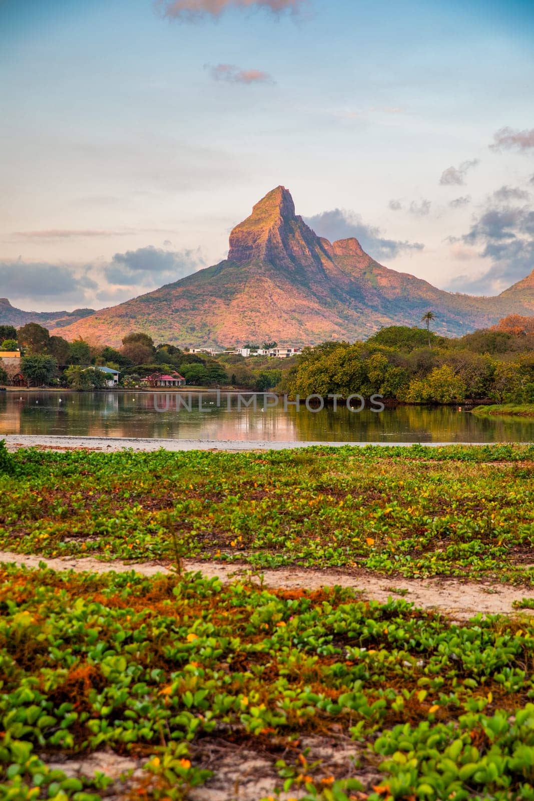 Rempart mountain view from Tamarin bay, Black river, scenic nature of Mauritius island. Beautiful nature and landscapes of Mauritius island. Rempart mountains view from Tamarin bay, Mauritius. by DaLiu