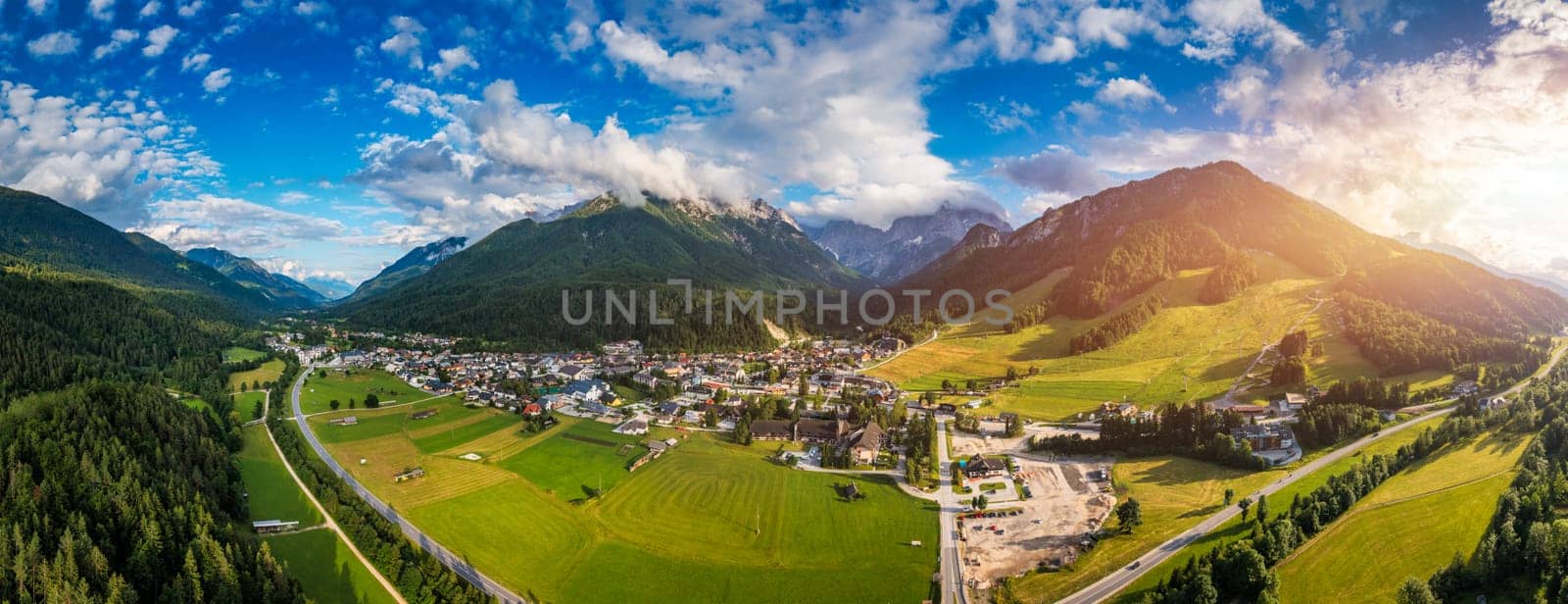 Kranjska Gora town in Slovenia at summer with beautiful nature and mountains in the background. View of mountain landscape next to Kranjska Gora in Slovenia, view from the top the town Kranjska Gora. by DaLiu