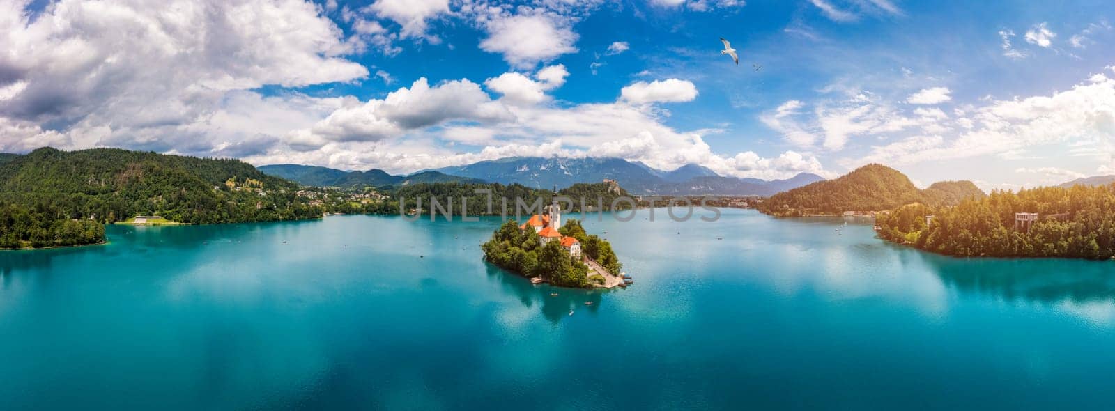 Lake Bled in Slovenia. Beautiful mountains and Bled lake with small Pilgrimage Church. Bled lake and island with Pilgrimage Church of the Assumption of Maria. Bled, Slovenia, Europe.