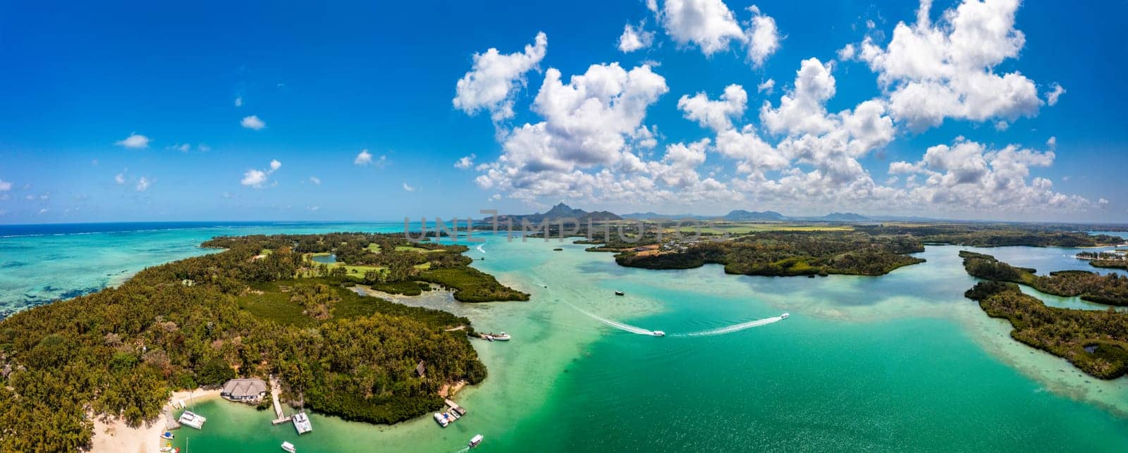 Ile aux Cerfs island with idyllic beach scene, aquamarine sea and soft sand, Ile aux Cerfs, Mauritius, Indian Ocean, Africa. Ile aux Cerf in Mauritius, beautiful water and breathtaking landscape.