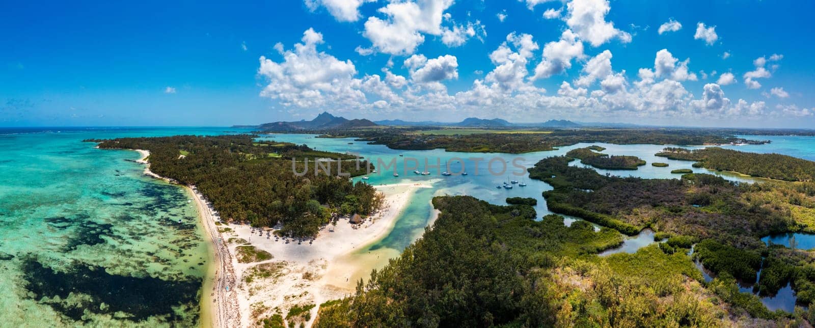 Ile aux Cerfs island with idyllic beach scene, aquamarine sea and soft sand, Ile aux Cerfs, Mauritius, Indian Ocean, Africa. Ile aux Cerf in Mauritius, beautiful water and breathtaking landscape.