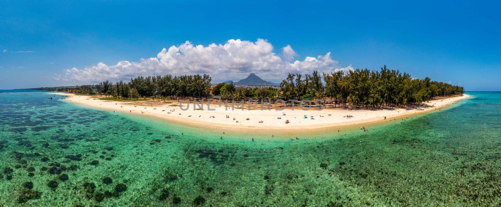 Beautiful Mauritius island with beach Flic en flac. Coral reef around tropical palm beach, Flic en Flac, Mauritius. Aerial view of a beautiful beach along the coast in Flic en Flac, Mauritius. by DaLiu