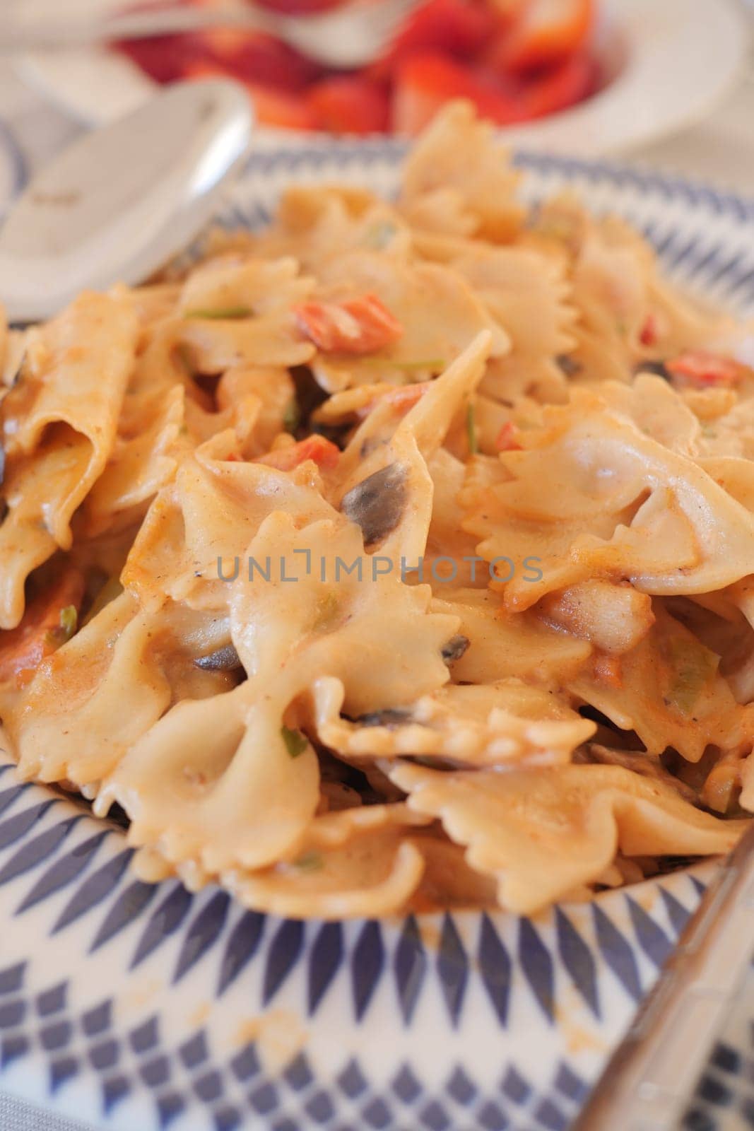 homemade cooked pasta in a plate on table