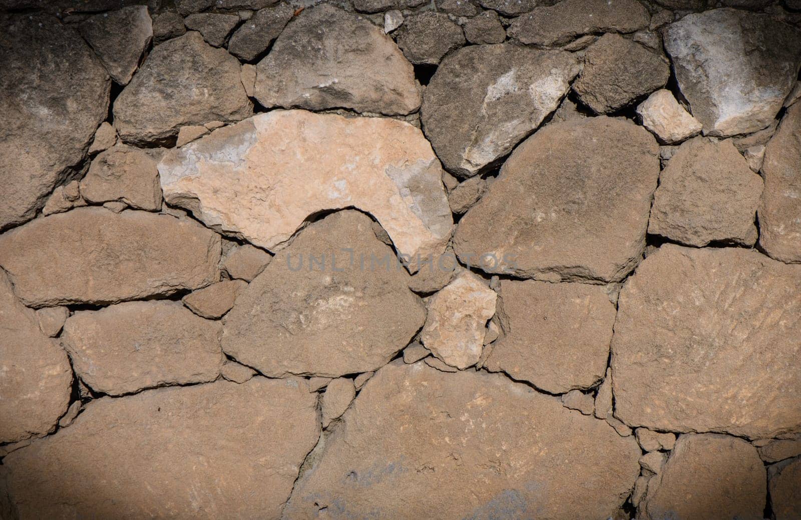 Wall of stones as a texture for background 2