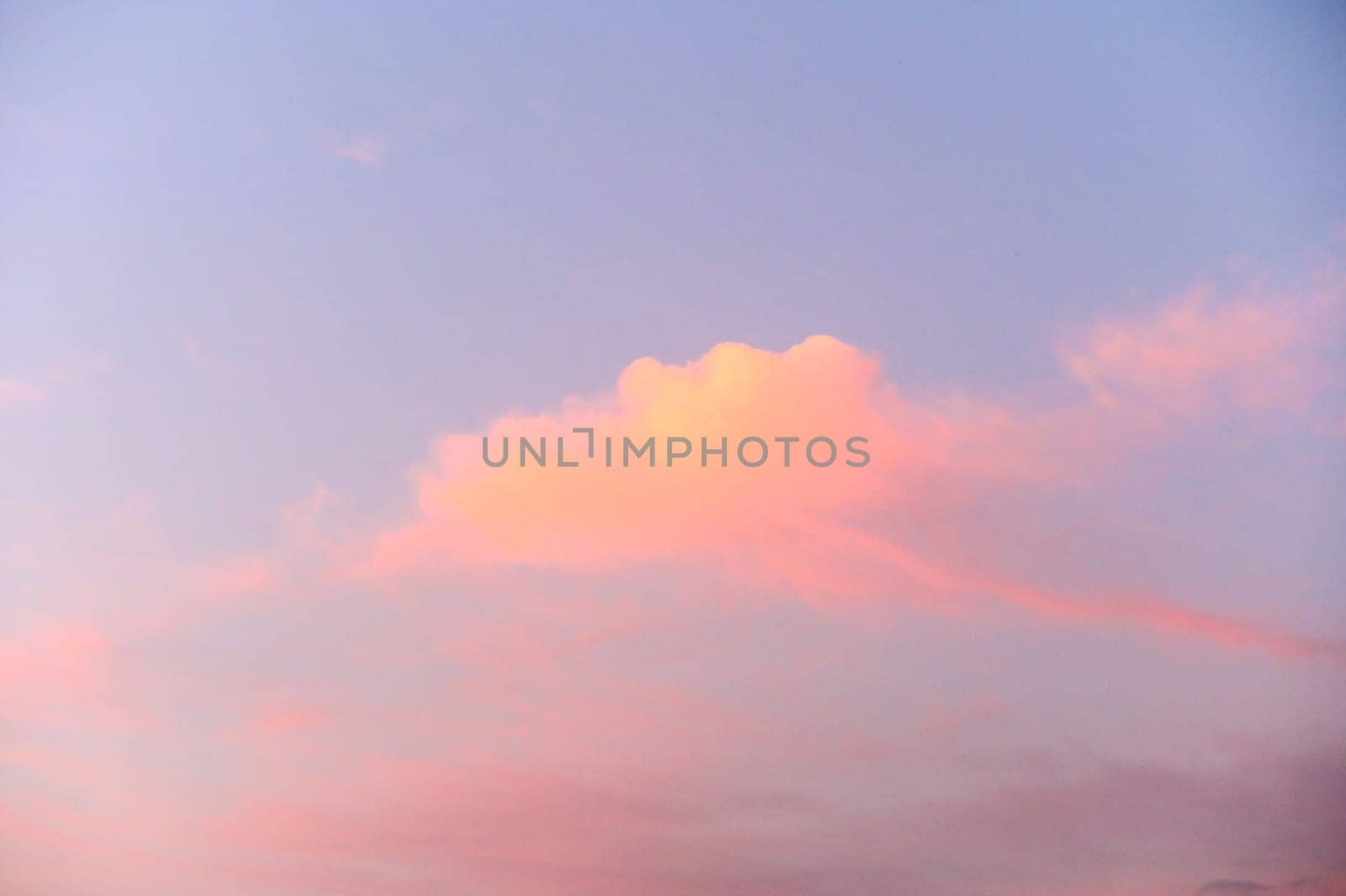 Light pink clouds in sunset blue sky. by Mixa74