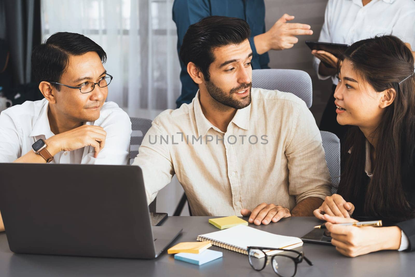 Group of diverse office worker employee working together on strategic business marketing planning in corporate office room. Positive teamwork in business workplace concept. Prudent