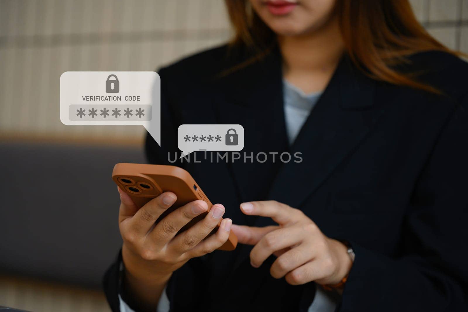 Young businesswoman typing on smartphone entering verification code for login. Cyber security concept.