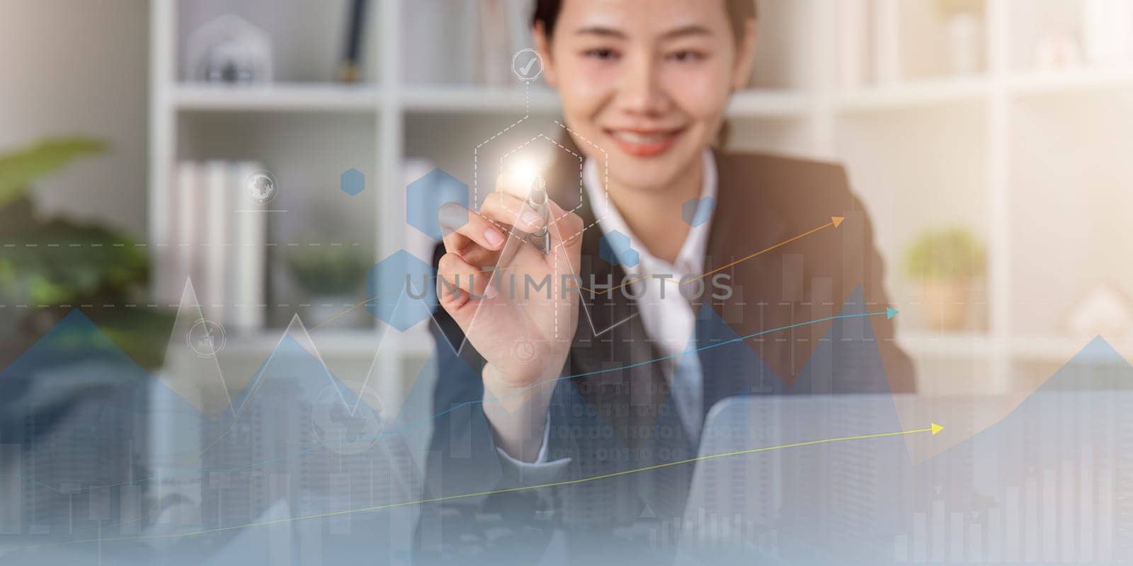 Businesswoman draw growth graph and progress of business and analyzing financial and investment data, development of success, business planning and strategy.
