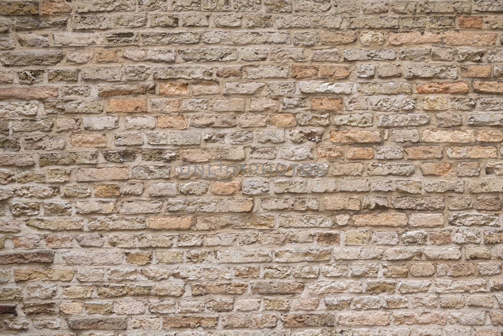 Beige old brick wall background grunge texture by Godi