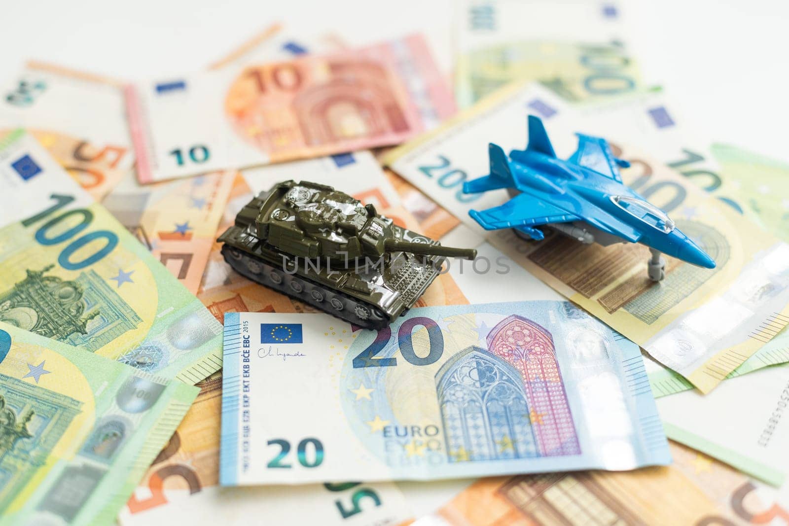 tank against the background of dollars. Concept of war. High quality photo