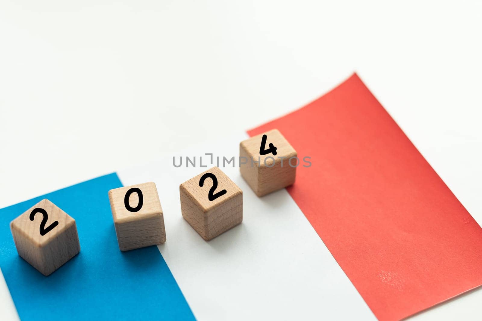 2024, France, France flag with date block, Concept, Important events for France in the new year, election, economy, social activities, central bank, France foreign policy. High quality photo