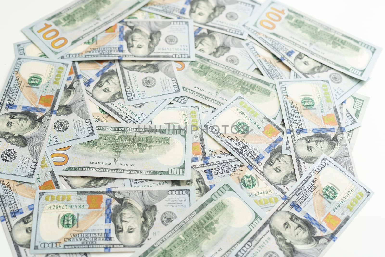 Very big amount of US hundred dollar bills close up. Huge quantity of united states currency notes on flat table. High quality photo