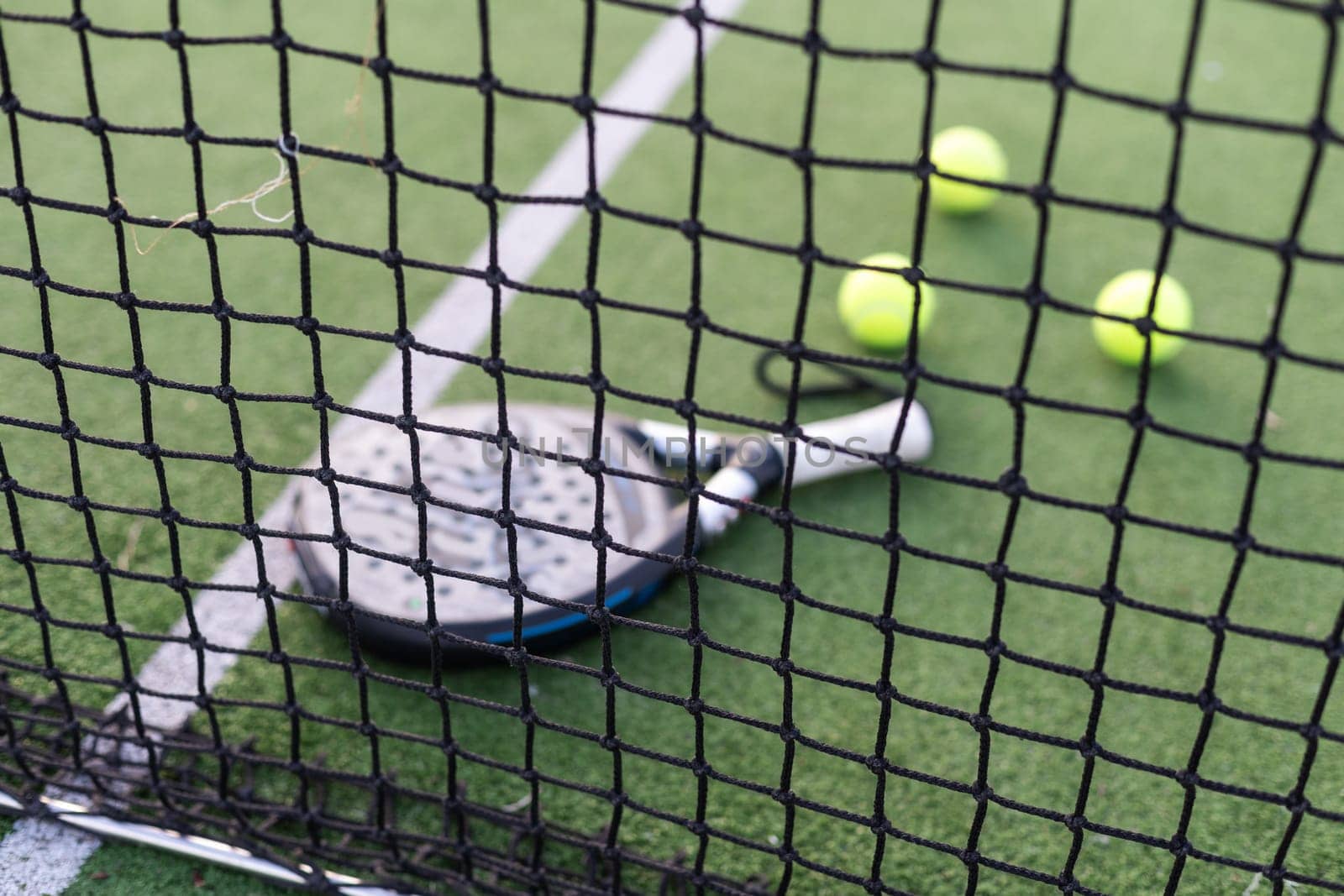 paddle rackets on the playing court. High quality photo