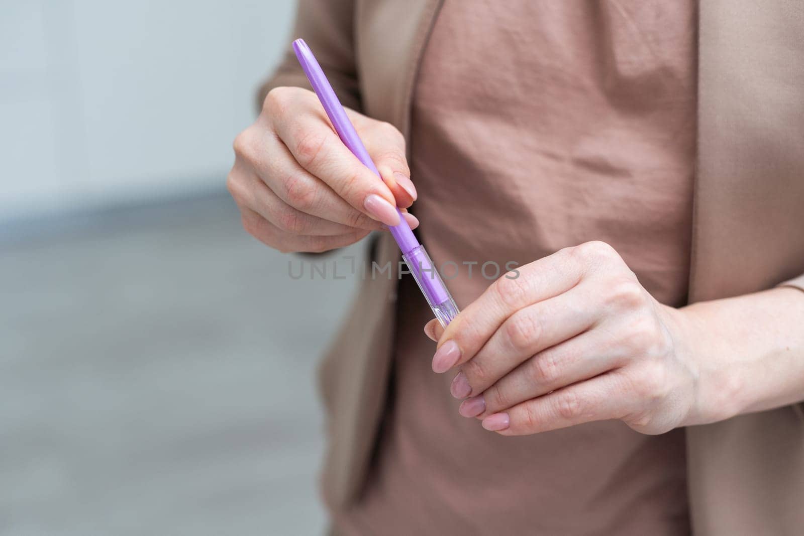 Using a hand hold the pen for writing. by Andelov13