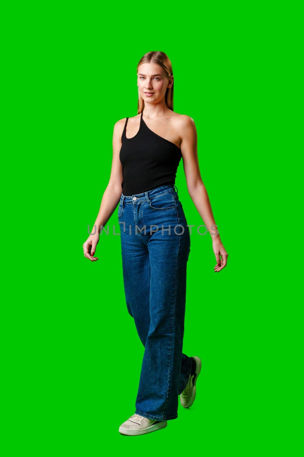 Blonde Woman in Black Tank Top Posing for Picture in studio