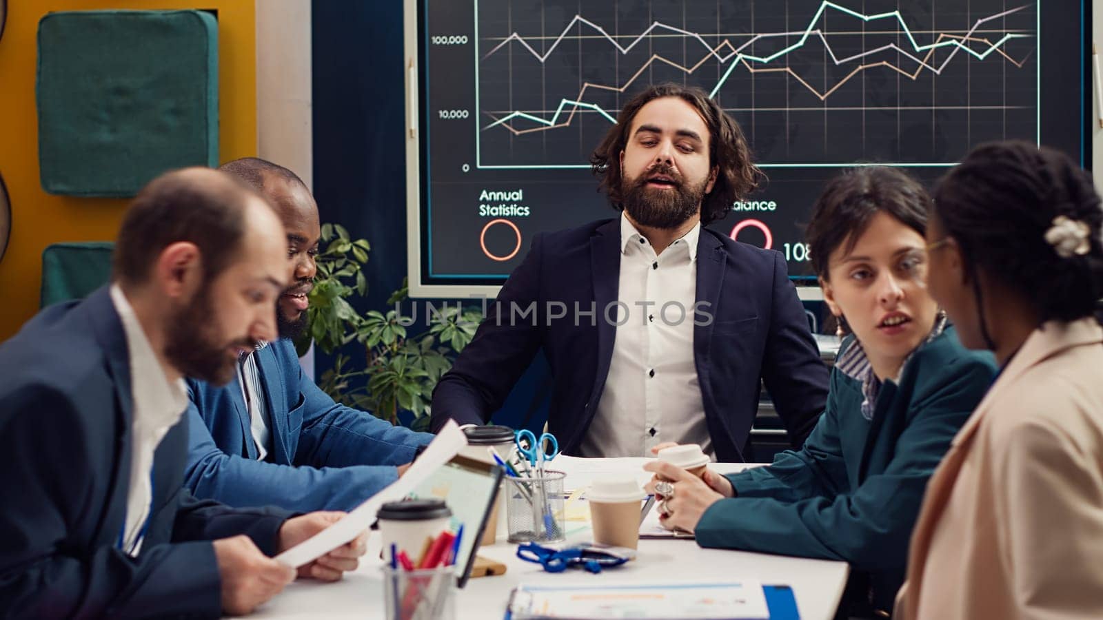 Management consultant inviting employees to a corporate briefing meeting, addressing conflicts or concerns among team members before starting important project. Organizational growth. Camera A.