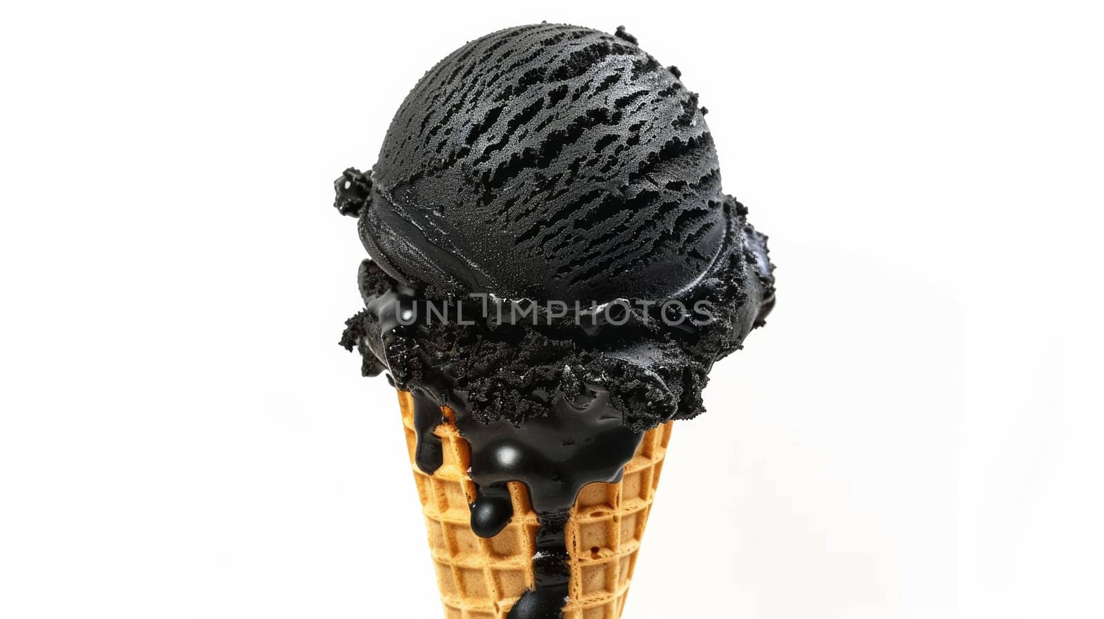 Black ice cream in waffles cone on white background.