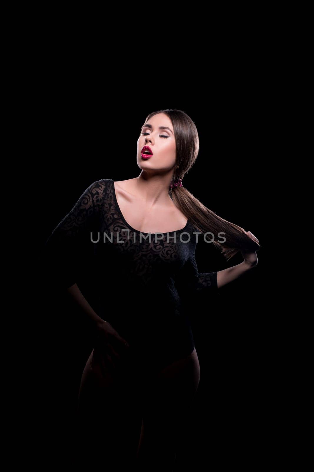 Cute long-haired model posing sexy with mouth open by rivertime
