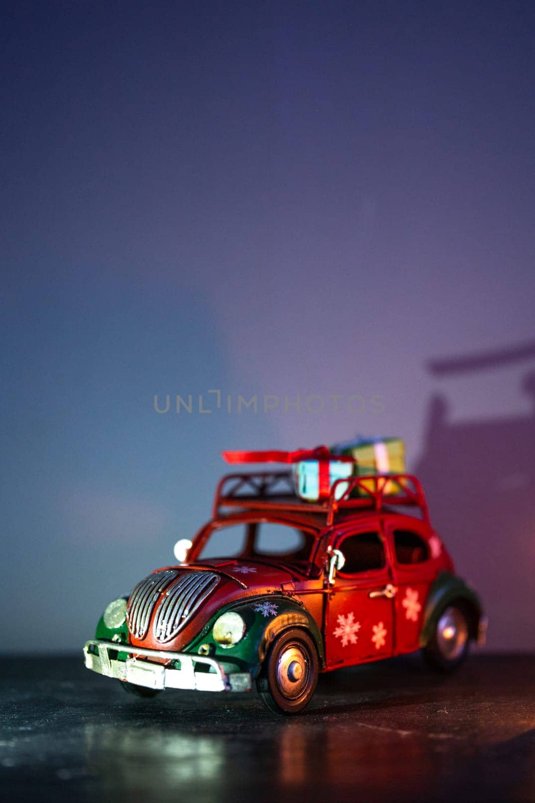 toy iron car model with gifts on the roof. interior detail.