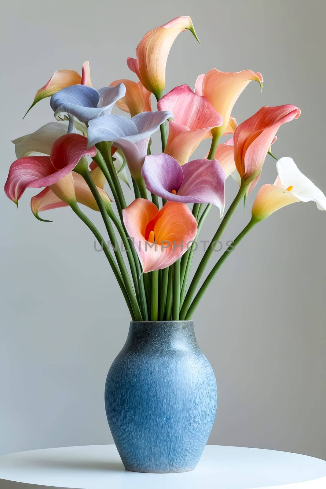 Blue vase with colorful calla lilies. Generative AI.
