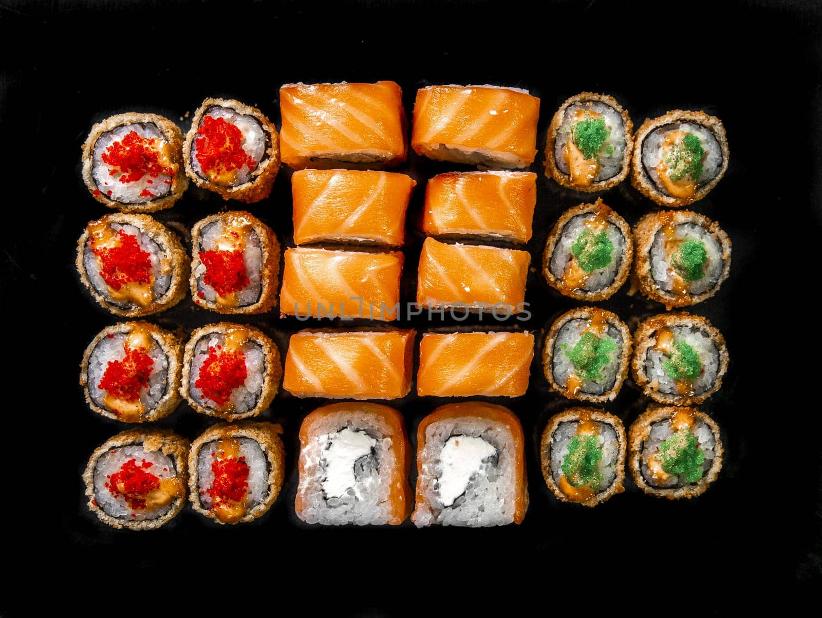 rolls set on a black background. three kinds roll for the menu by Pukhovskiy