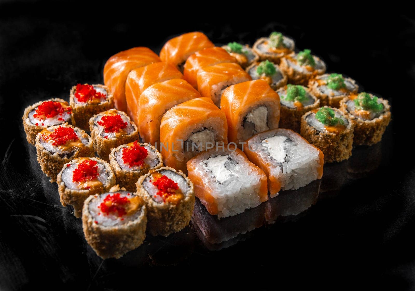 rolls set on a black background. three kinds roll for the menu