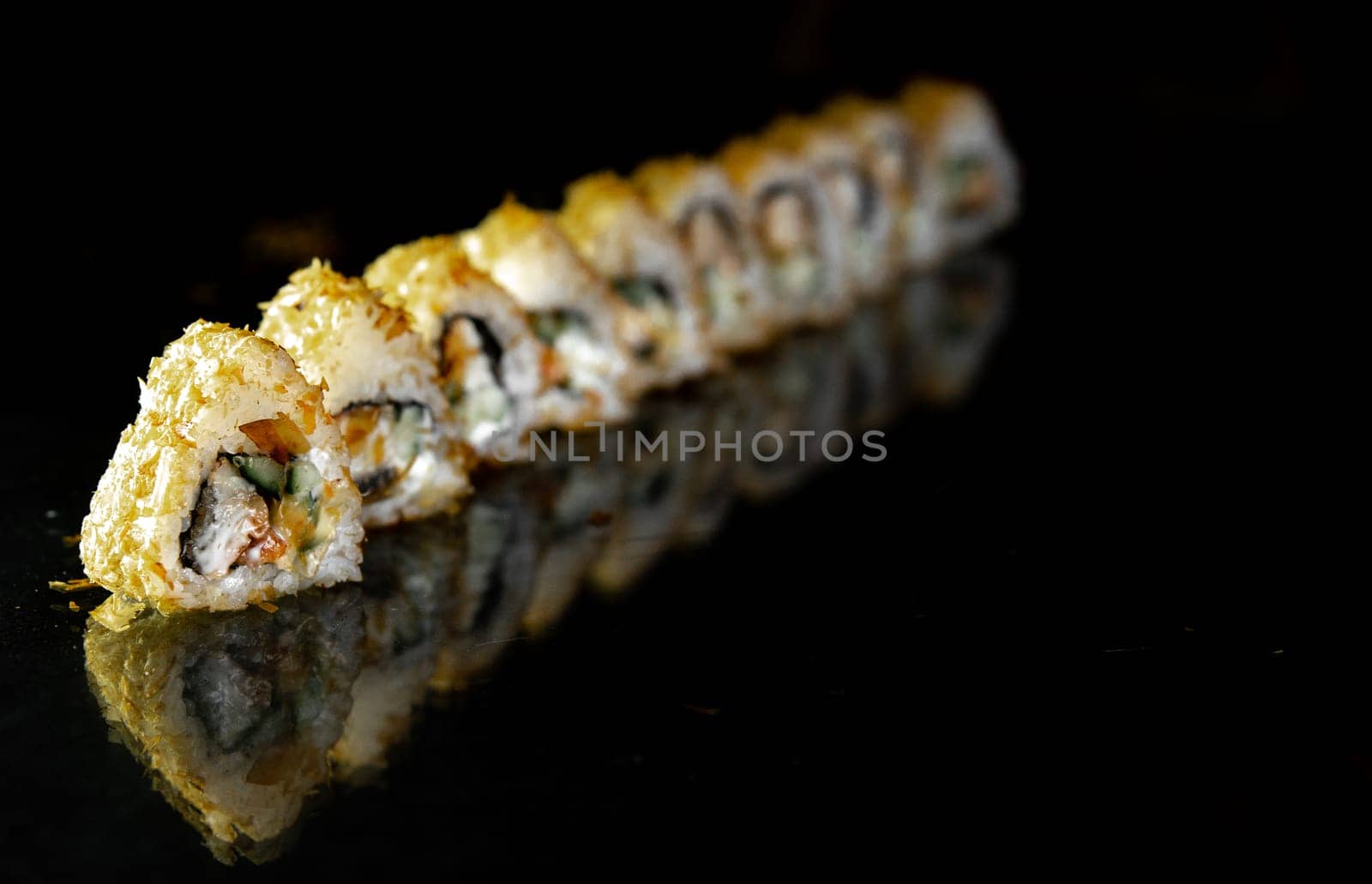 rolls in perspective, isolated on black background, food photography for design