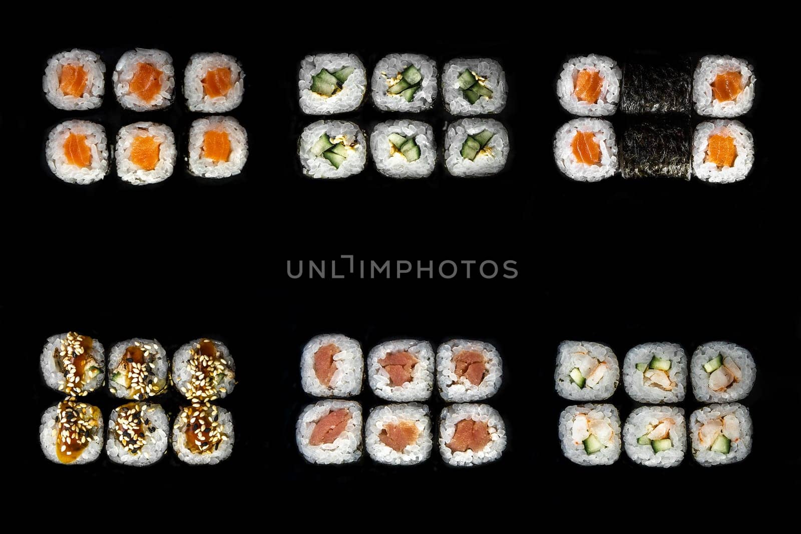 japanese roll set. a set of rolls and sushi on a black background.