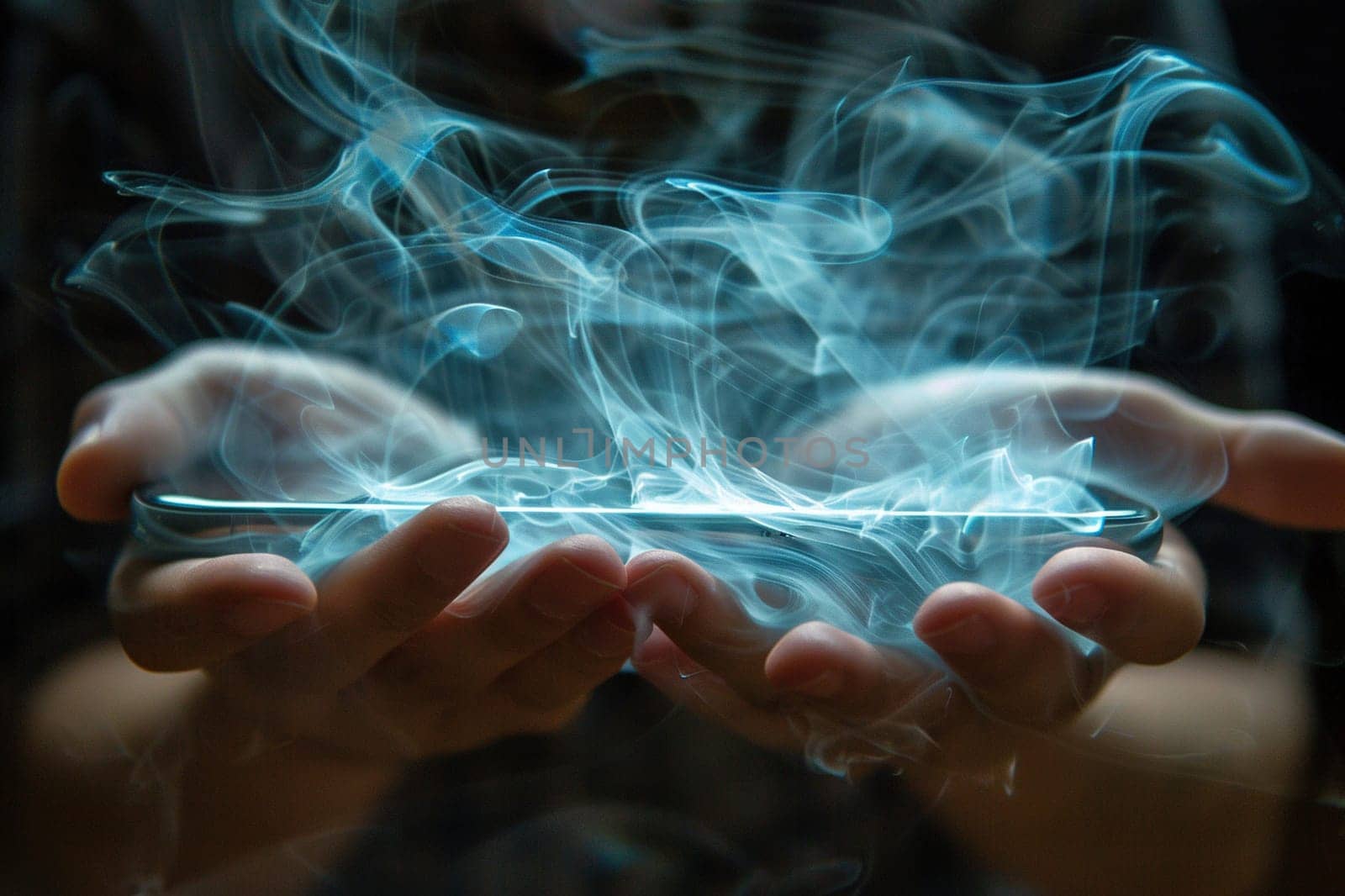 A modern smartphone in a hands in a cloud of smoke on a dark background, close-up.