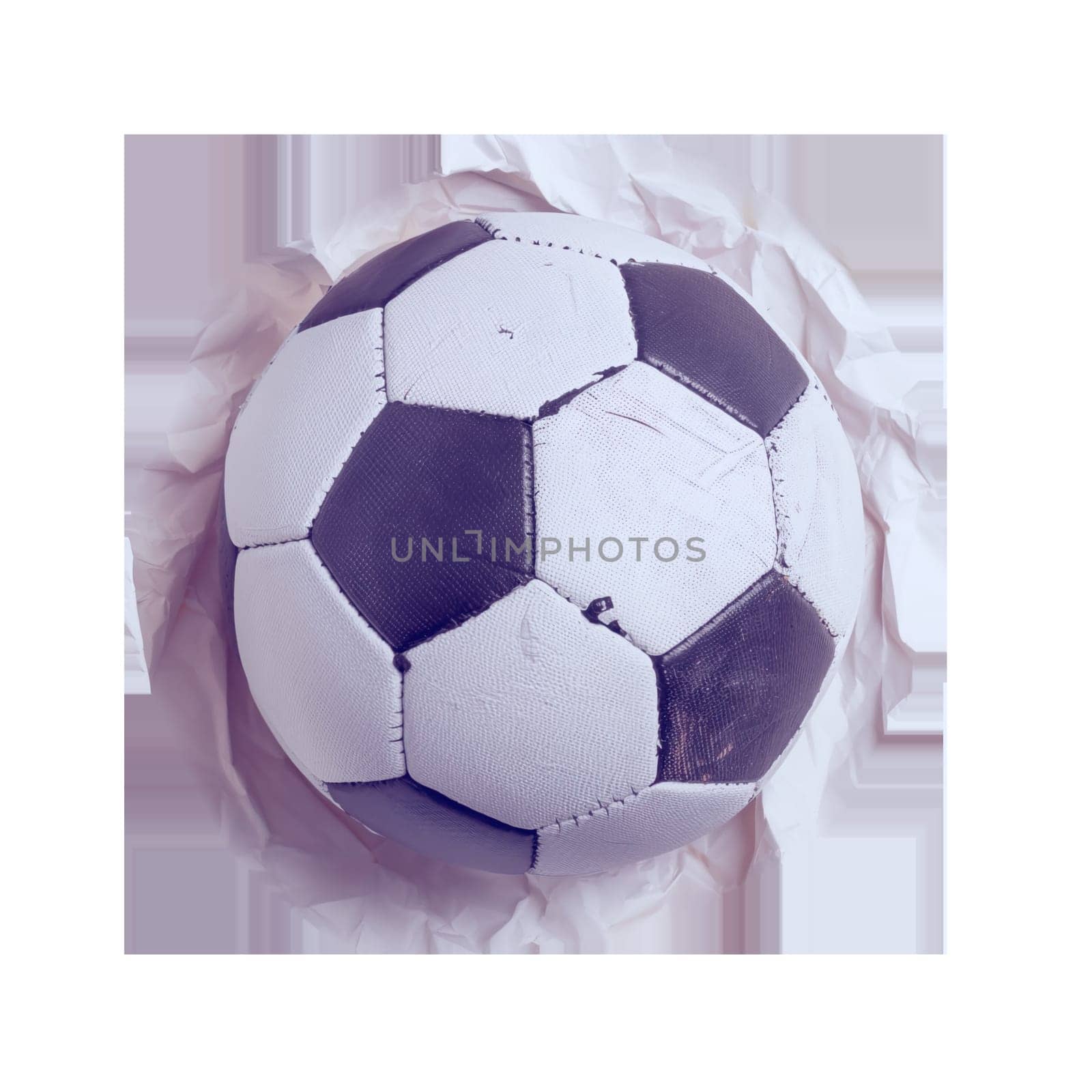 Soccer ball on crumpled paper cut out image by Dustick