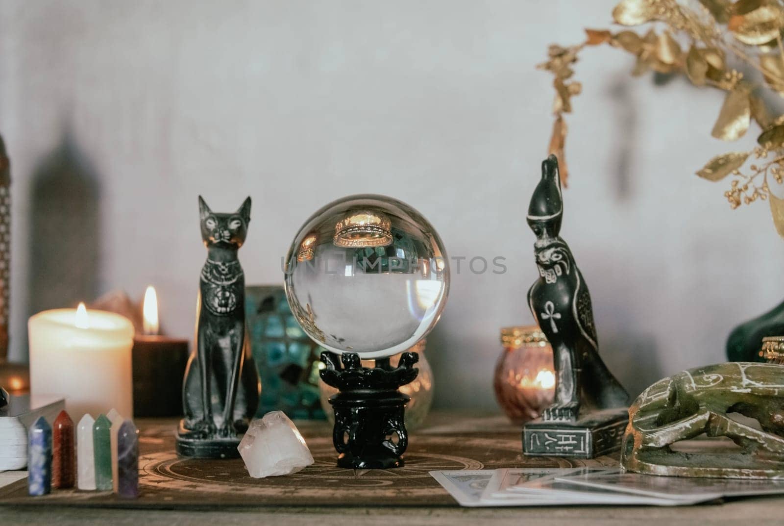 Esoteric Divination Setup with Tarot Cards and Crystal Ball