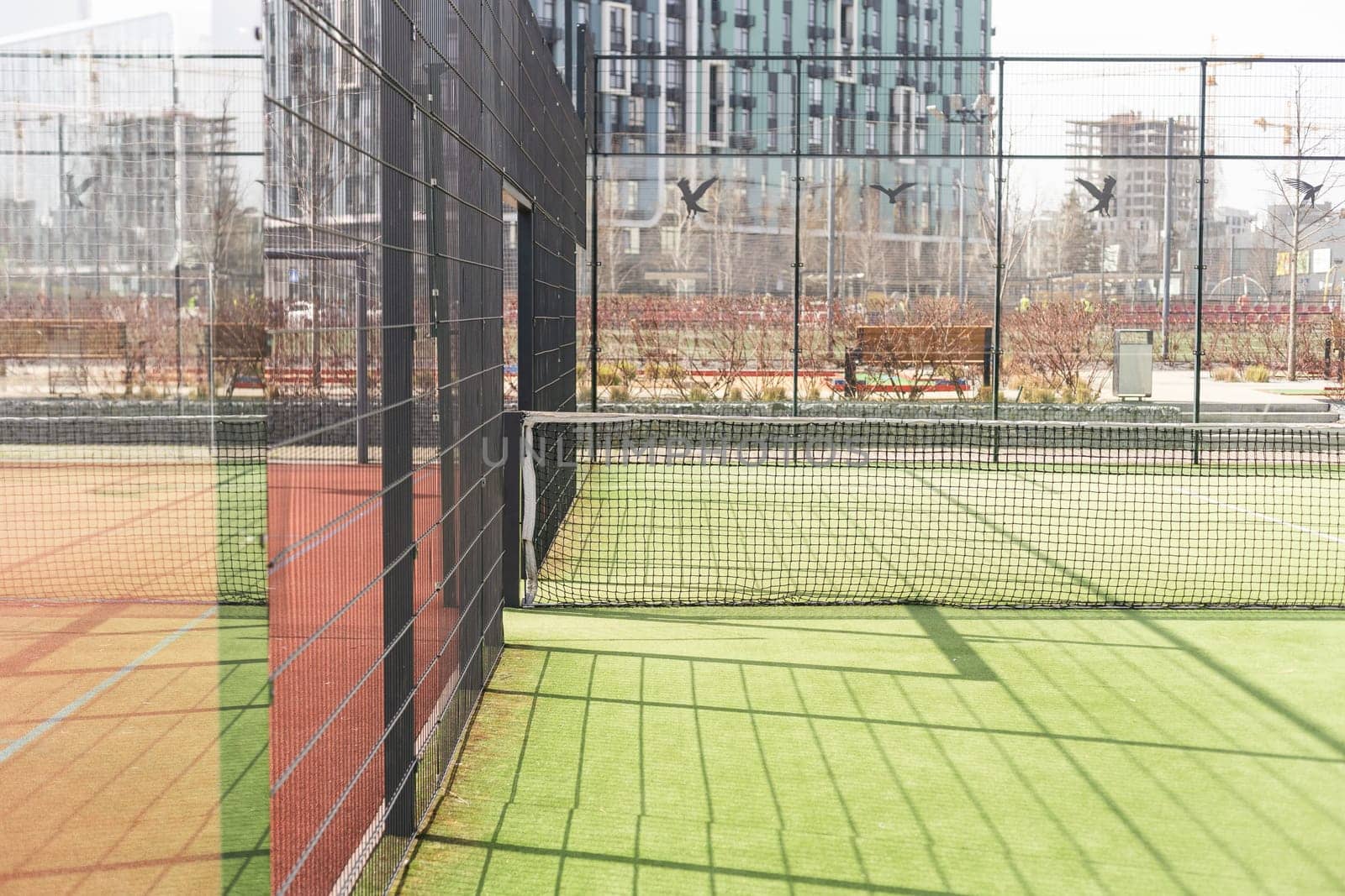 View of multi-functional sports area with tennis courts. High quality photo