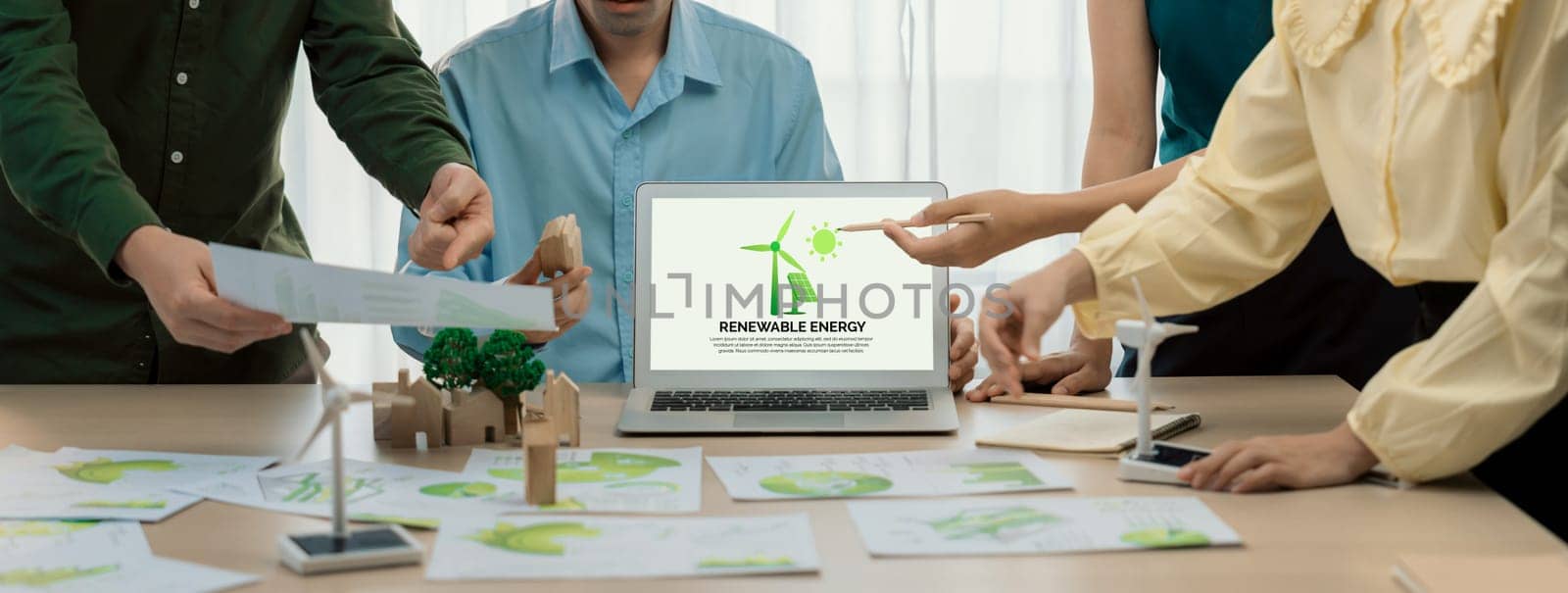 Renewable energy logo displayed on laptop. Eco conservative concept. Delineation by biancoblue