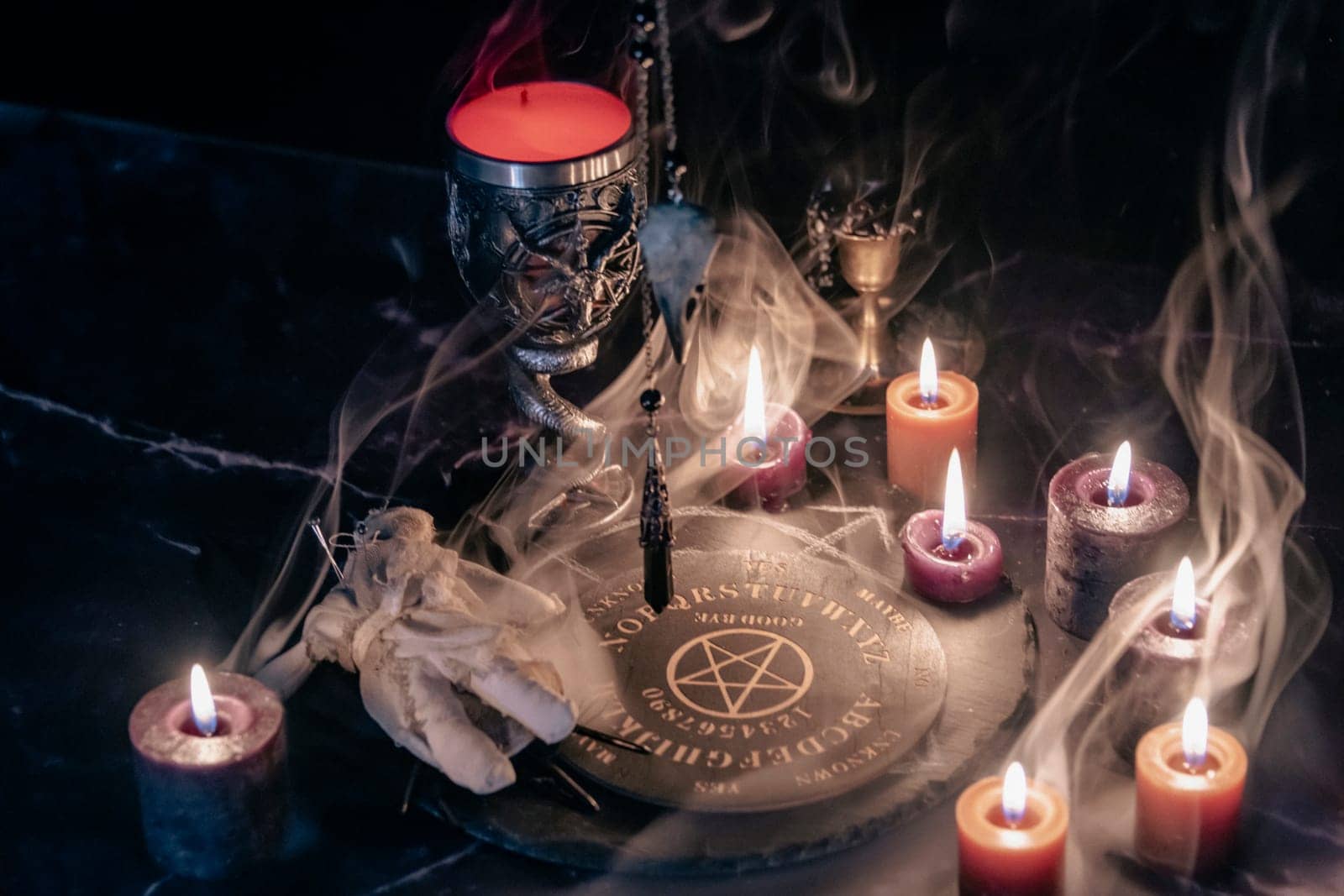 Mysterious Occult Ceremony with Pendulum and Mystic Symbols