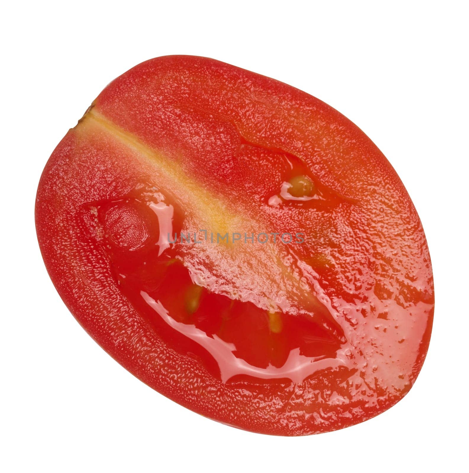 Half of a ripe cherry tomato on an isolated background, top view