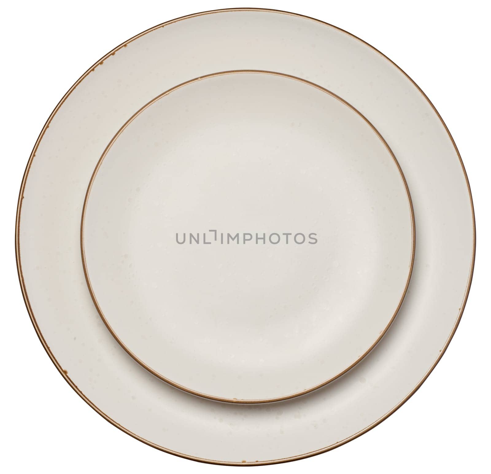 Two empty white ceramic plate with brown edge on isolated background, top view. Dishes on top of each other