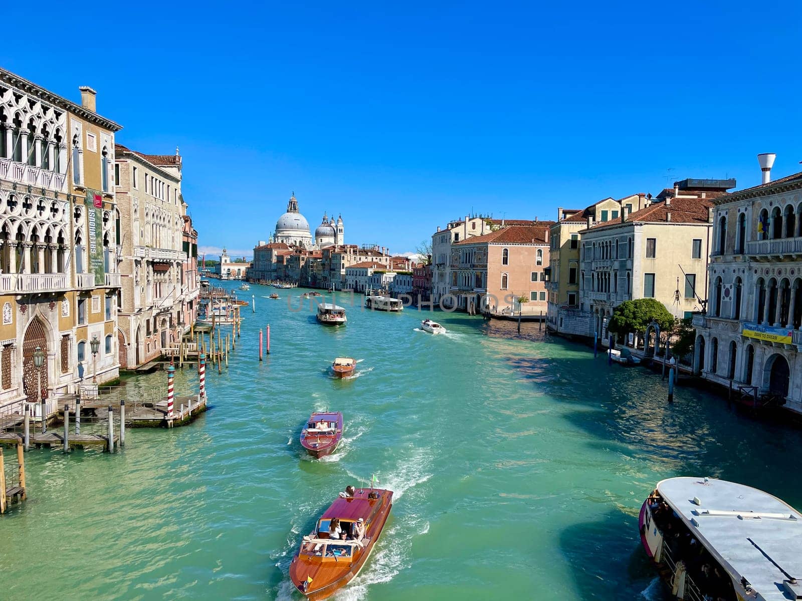 Italy, Venice, April 25, 2024.View on the Grand Canal, the most famous channel of Venice between by MilaLazo
