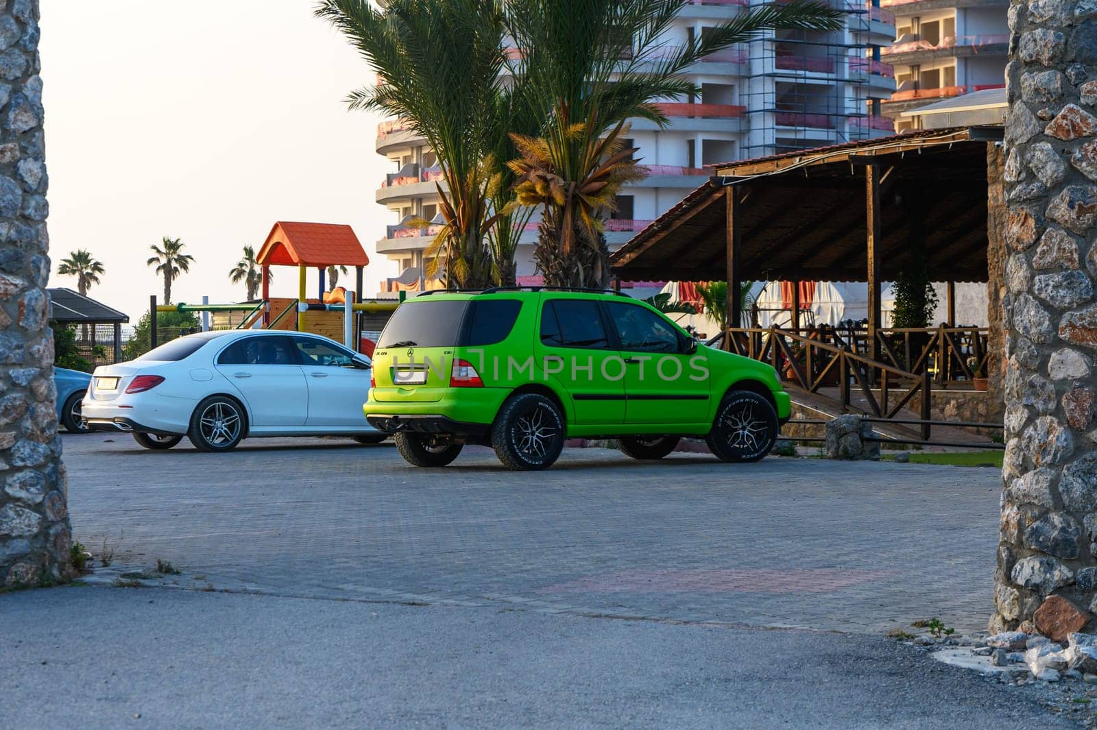 Gaziveren Cyprus - 04.24.2024 green Mercedes ML in the parking lot 1