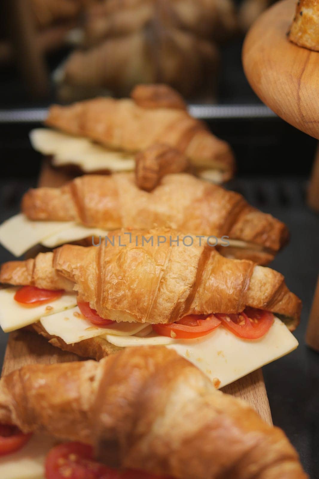 fresh baked croissant in a bakery by towfiq007