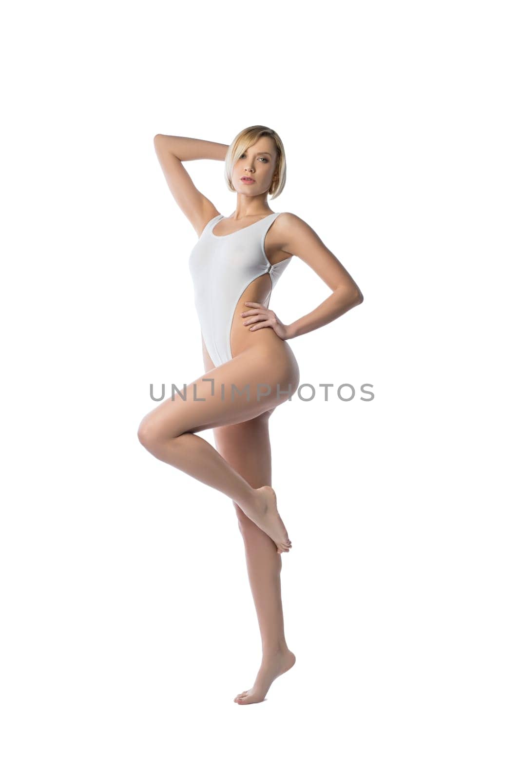 Model with bob haircut advertises sexy bodysuit. Isolated on white background